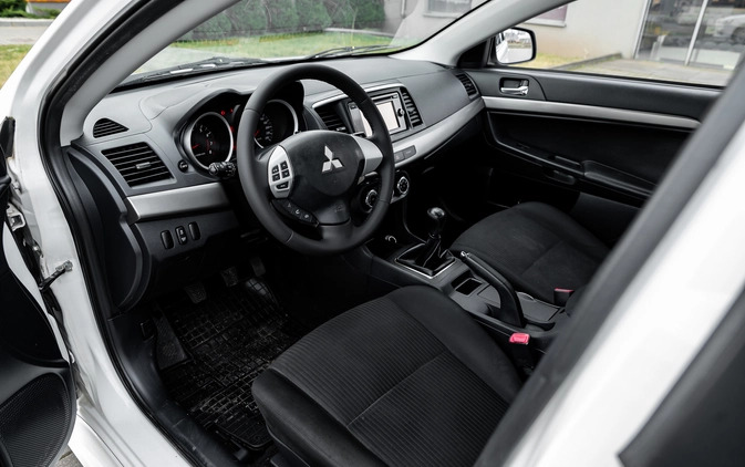 Mitsubishi Lancer cena 32900 przebieg: 150000, rok produkcji 2014 z Radom małe 596